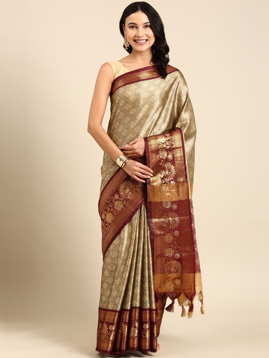 

Mitera Beige Ethnic Motifs Woven Design Zari Silk Cotton Saree