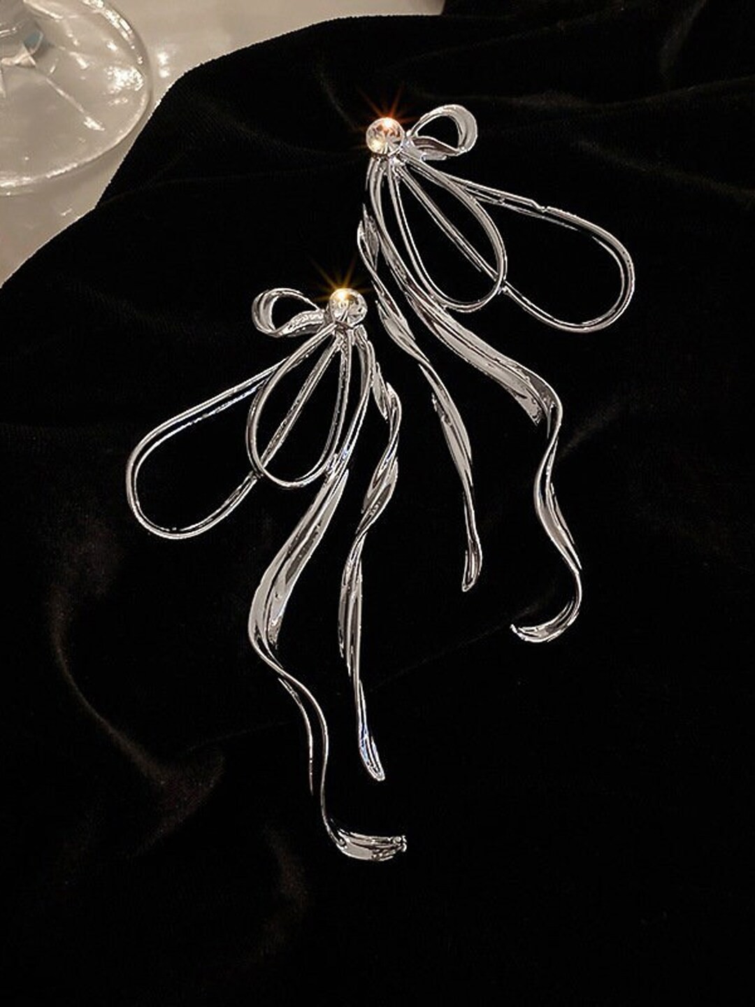 

Krelin Silver Plated Stone Studded Wired Bow Drop Earrings