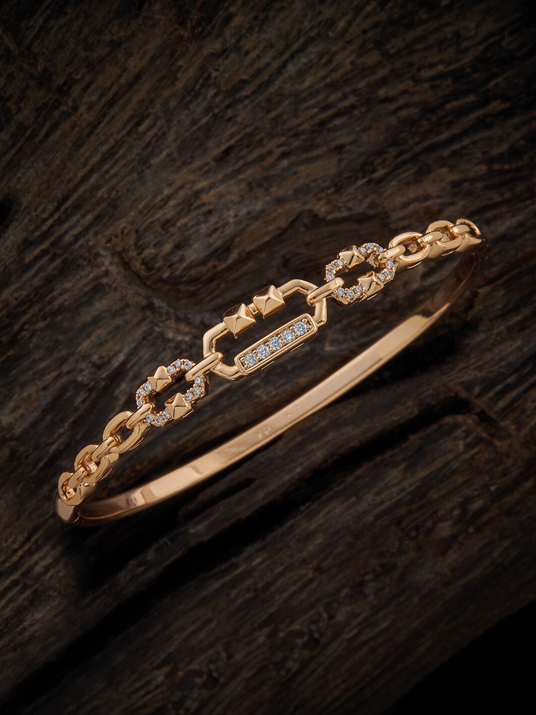 

Kushal's Fashion Jewellery Cubic Zirconia Gold-Plated Bangle-Style Bracelet
