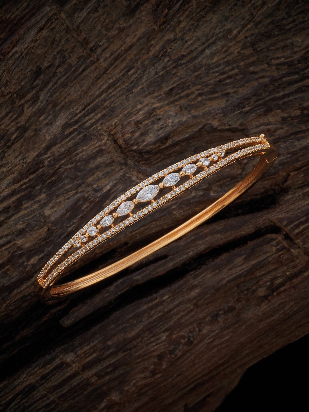 

Kushal's Fashion Jewellery Women Gold-Plated Cubic Zirconia Studded Kada Bracelet
