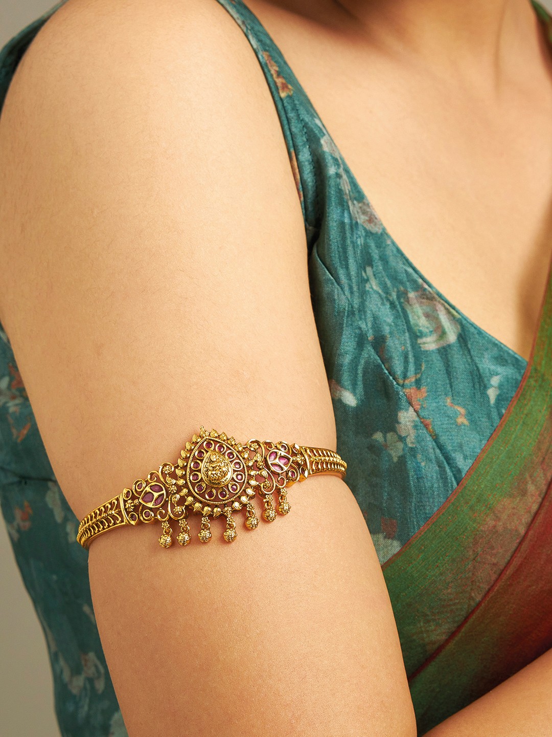 

Kushal's Fashion Jewellery Gold-Plated Stones Studded Antique Armlet Bracelet