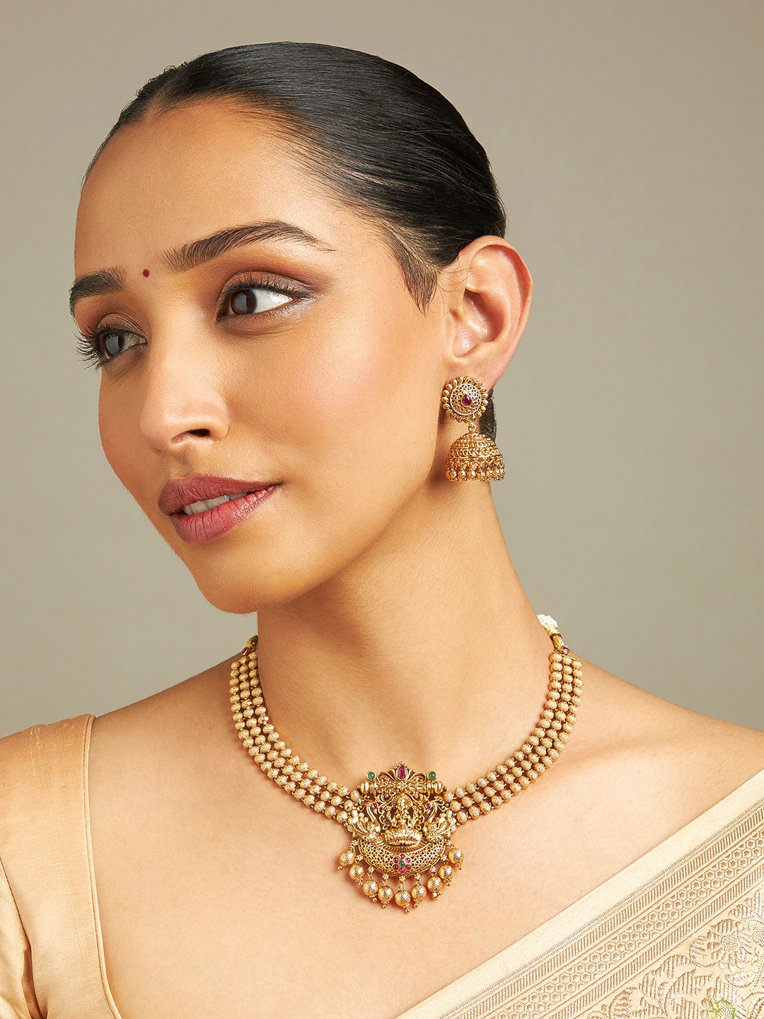 

Kushal's Fashion Jewellery Gold Plated Stone Studded Antique Jewellery Set