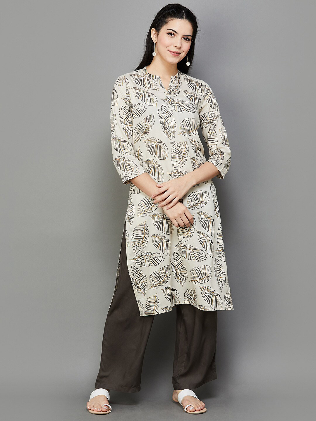 

Melange by Lifestyle Floral Printed Regular Kurta with Palazzos, Beige