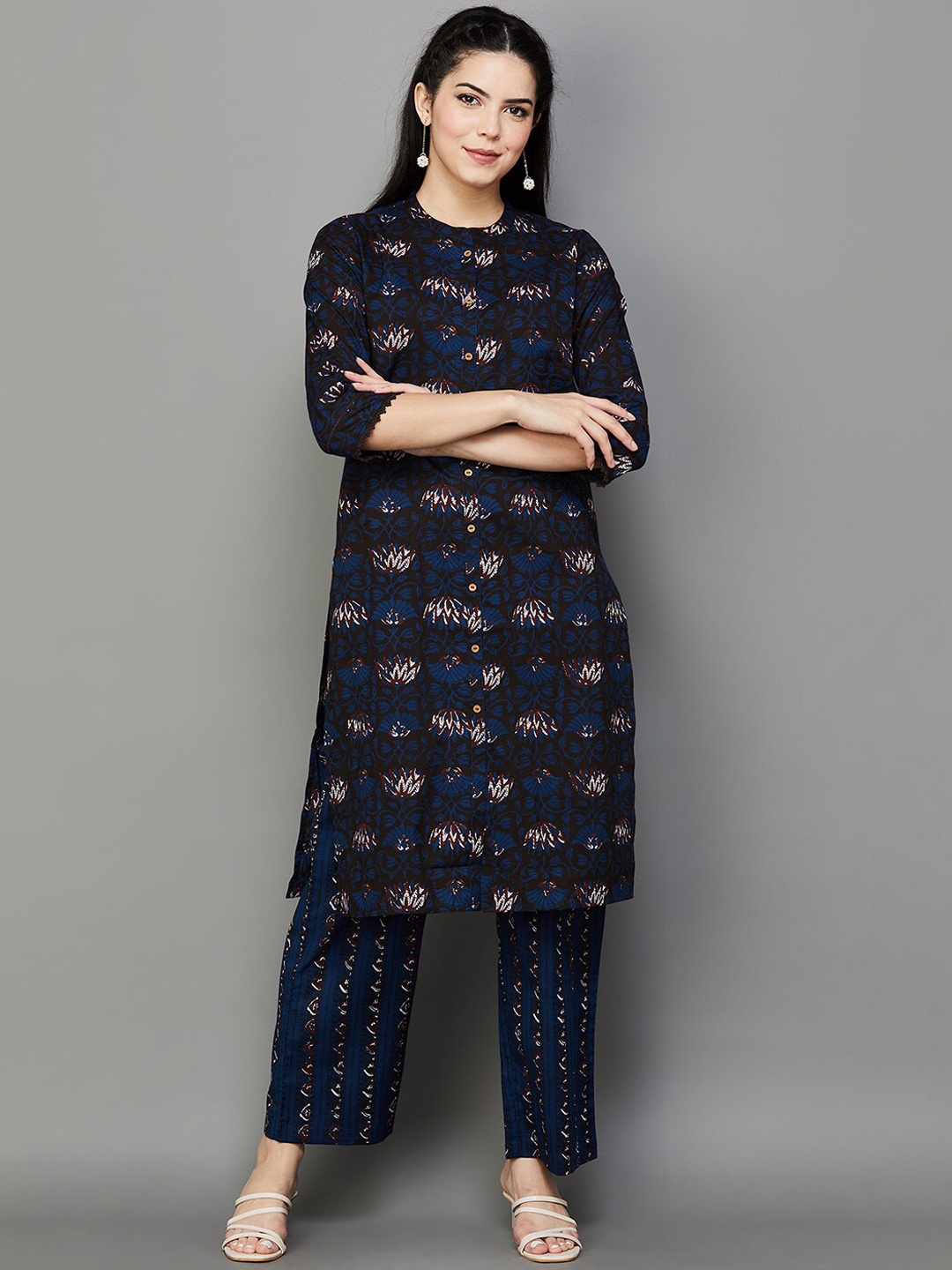 

Melange by Lifestyle Floral Printed Regular Kurta with Trousers, Violet