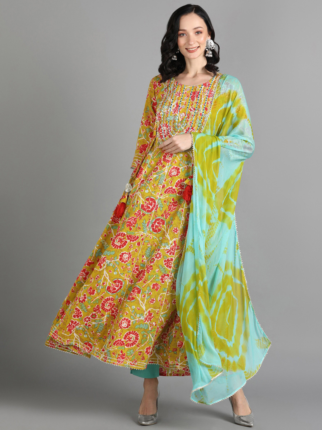 

AAYUMI Floral Printed Mirror Work Anarkali Kurta With Trousers & Dupatta, Mustard