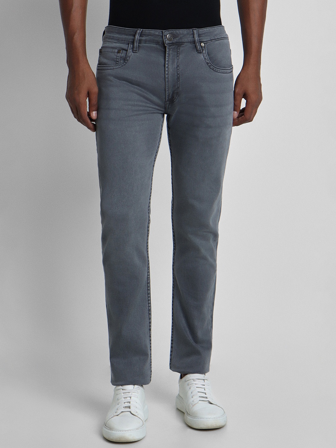 

Peter England Men Tapered Fit Mid-Rise Stretchable Jeans, Grey