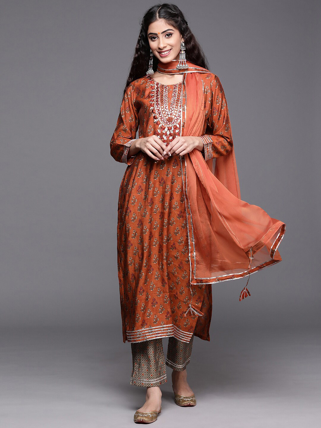 

KSUT Ethnic Motifs Printed Thread Work Kurta with Trousers & Dupatta, Orange
