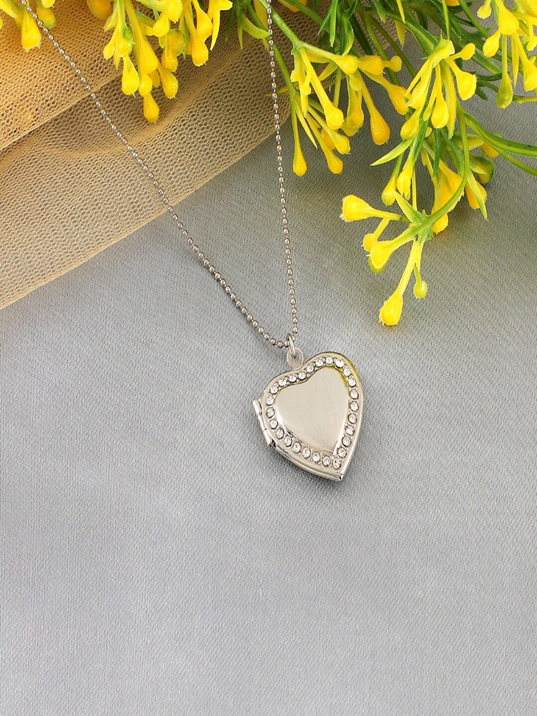 

UNIVERSITY TRENDZ Silver Plated Crystal Studded Heart Locket Pendant With Chain