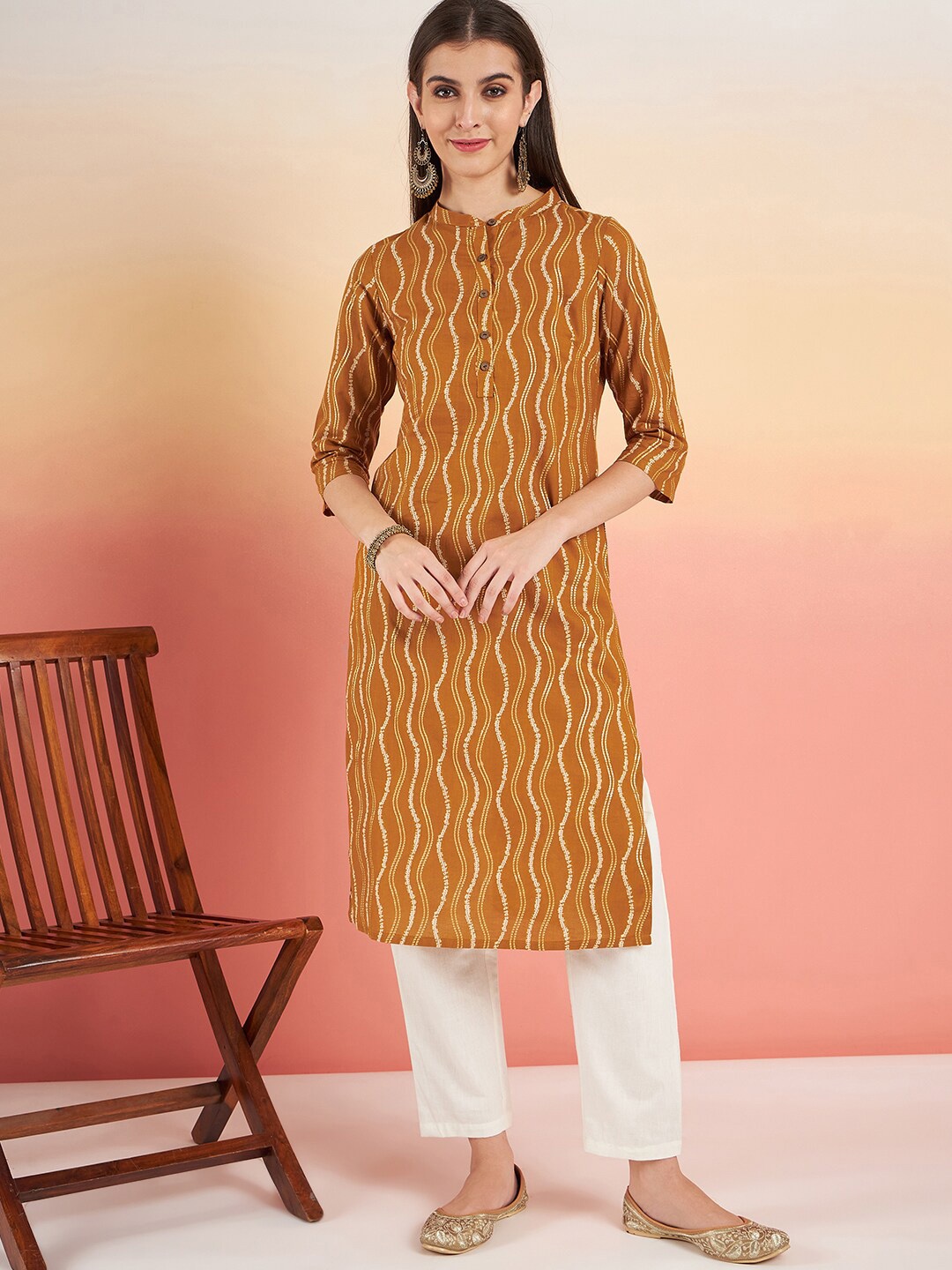 

Sangria Abstract Printed Pure Cotton Straight Kurta, Mustard