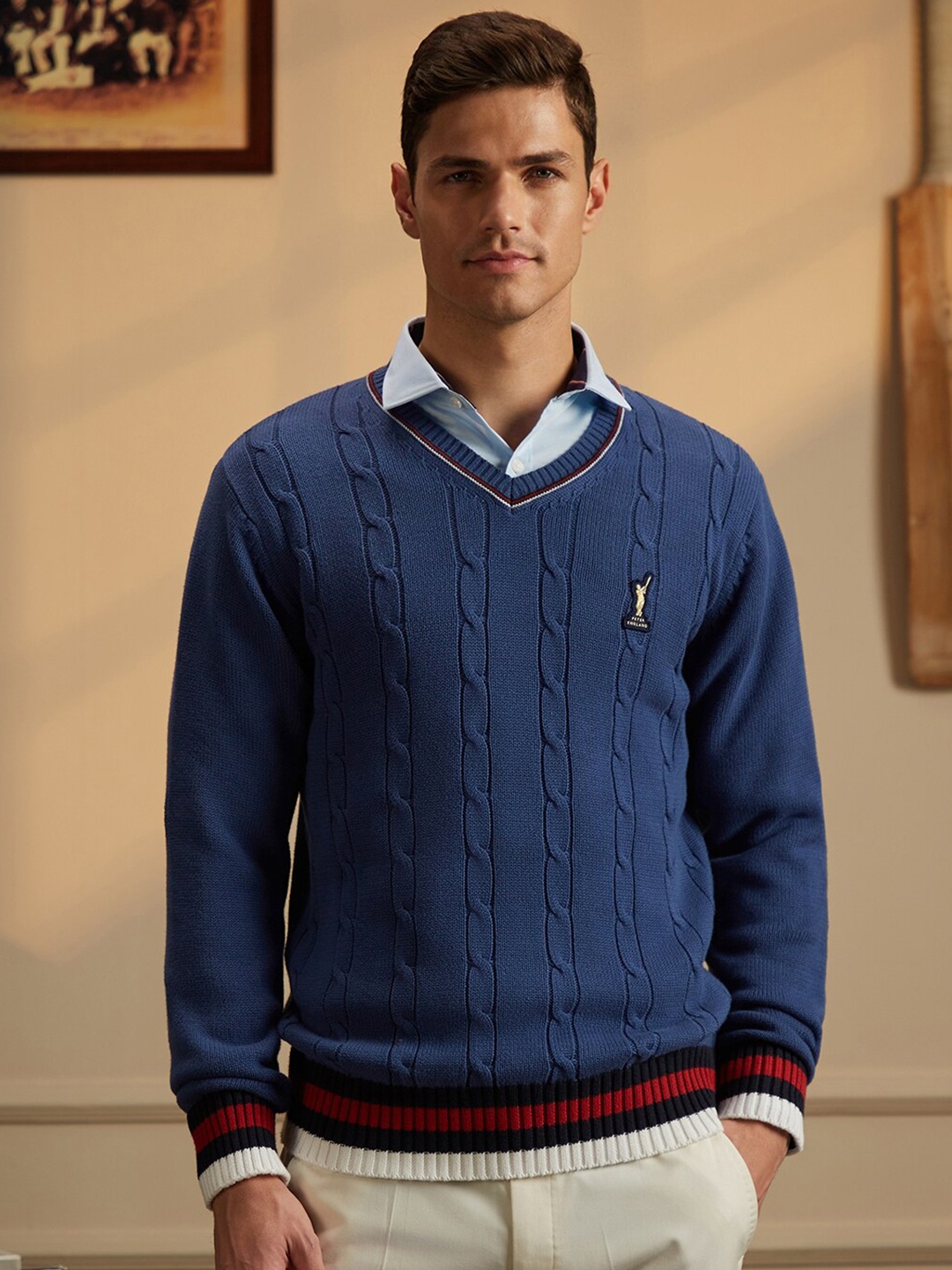 

Peter England Casuals Cable Knit Self Design Cricket Inspired V-Neck Pure Cotton Pullover, Blue