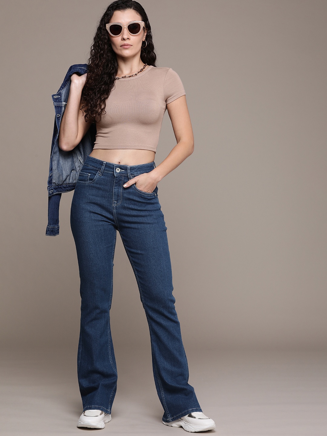 

The Roadster Life Co. Women Flared High-Rise Light Fade Stretchable Jeans, Blue