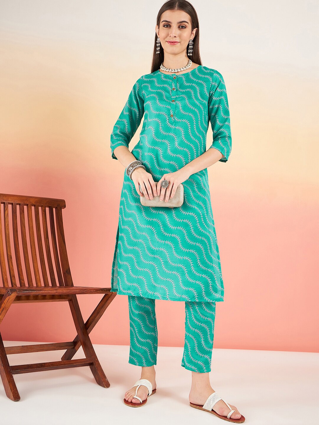 

Sangria Green Striped Round Neck Kurta With Trousers