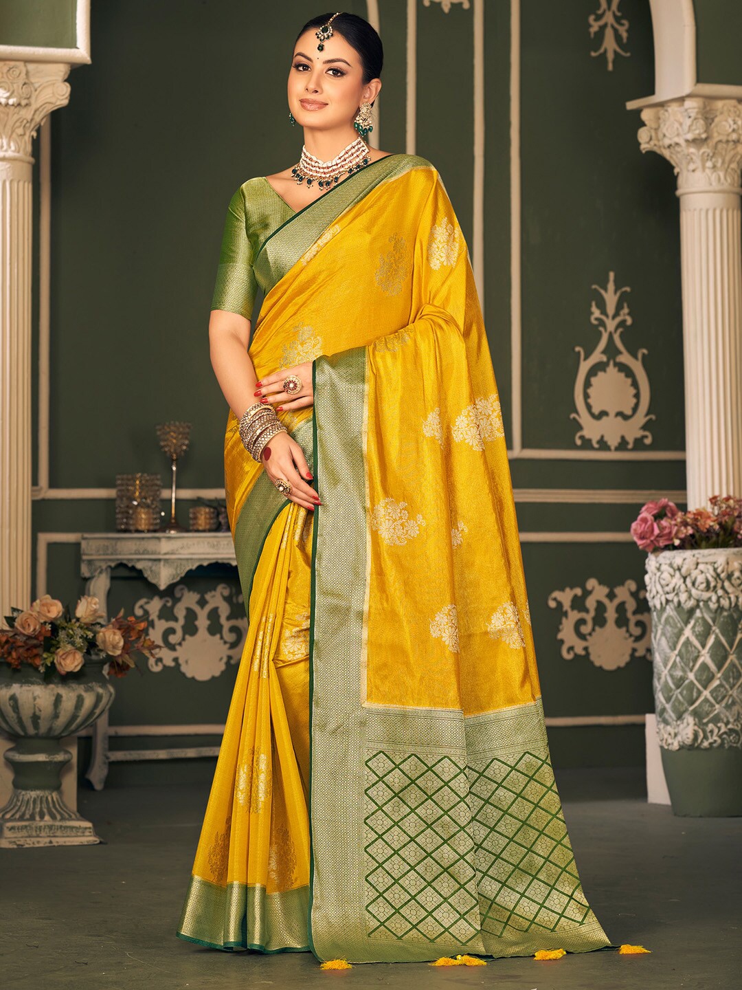 

Mitera Yellow & Green Ethnic Motif Woven Design Zari Banarasi Saree
