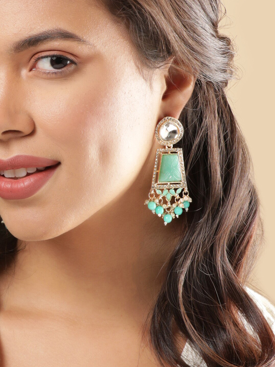

Rubans Gold Plated Stones Studded and Beaded Drop Earrings