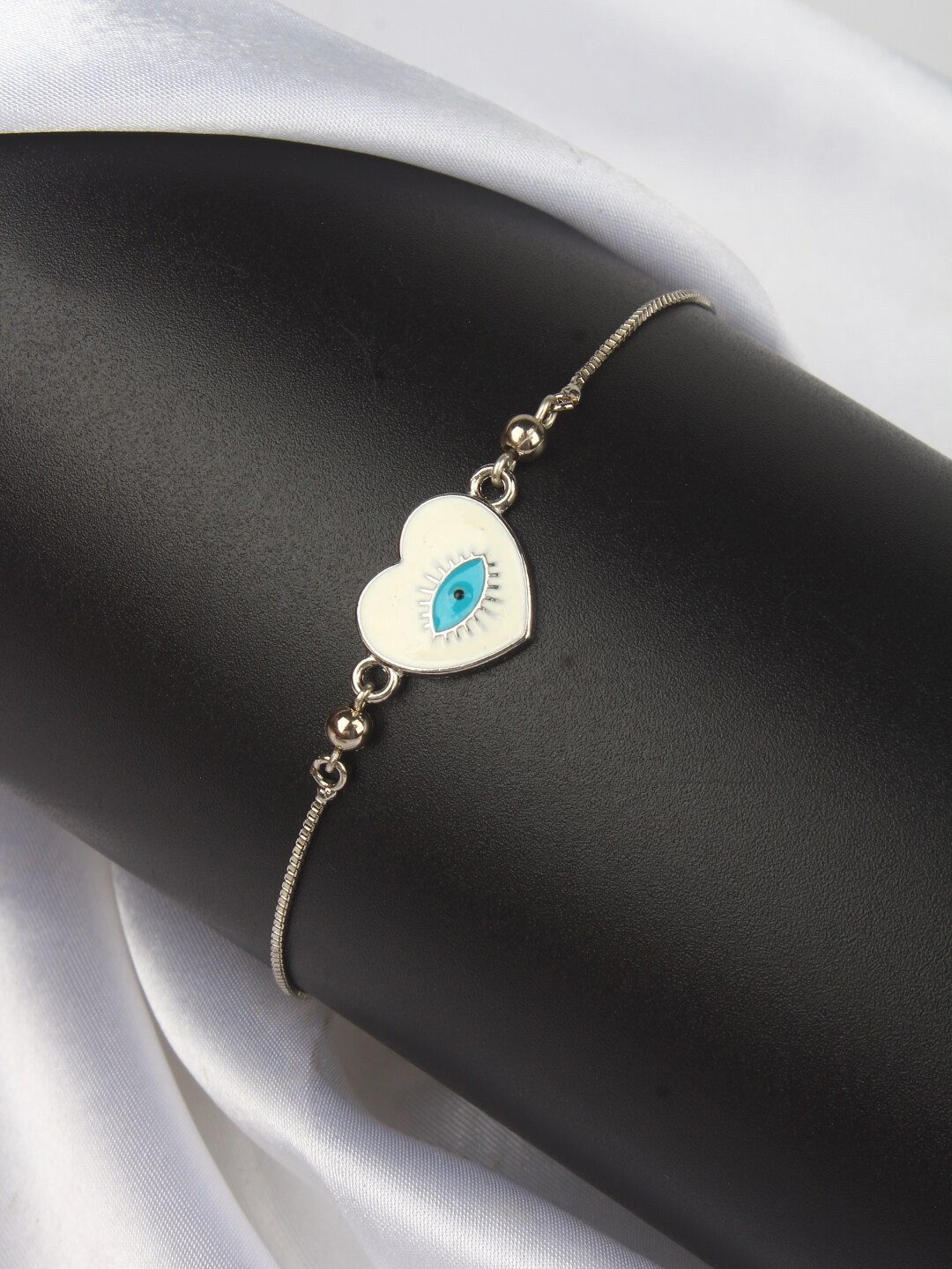 

Stylecast X KPOP Silver Plated Heart Shaped Evil Eye Charm Bracelet