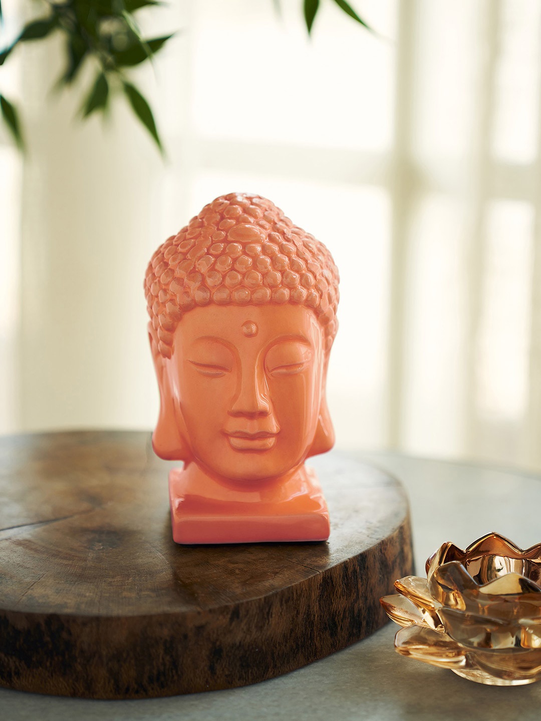 

Pure Home and Living Orange Textured Buddha Head Ceramic Figurine Showpiece