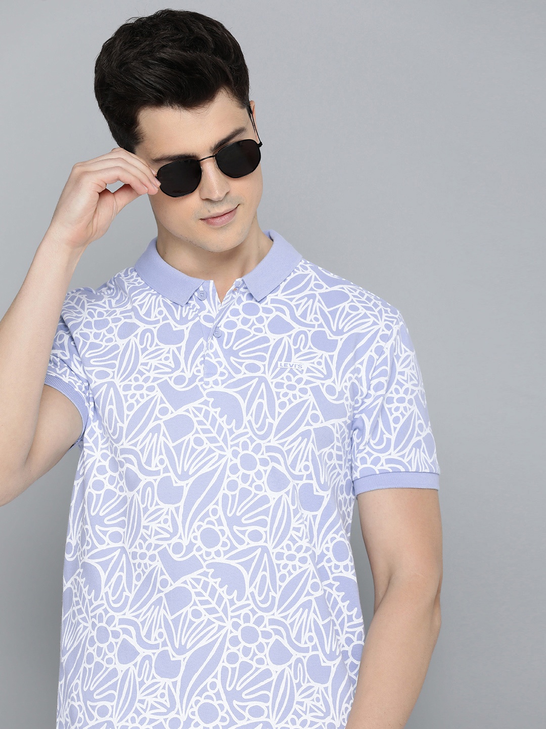 

Levis Men Abstract Printed Polo Collar Pure Cotton T-shirt, Blue