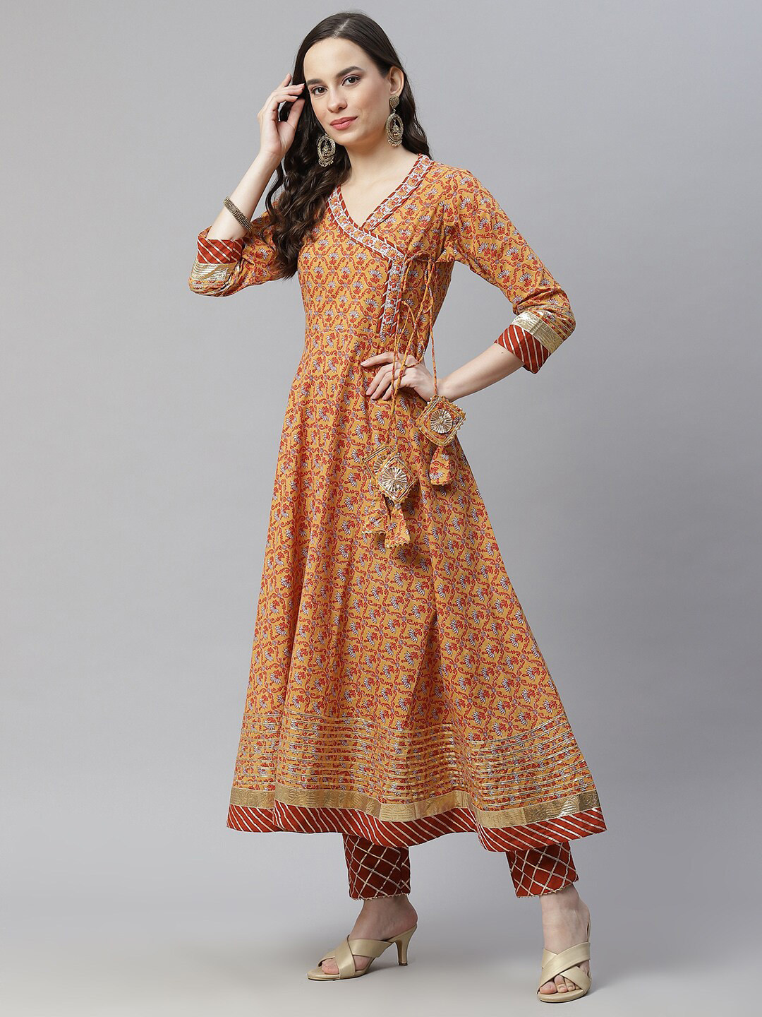 

Hatheli Ethnic Motifs Printed Pure Cotton Angrakha Anarkali Kurta With Trousers, Yellow