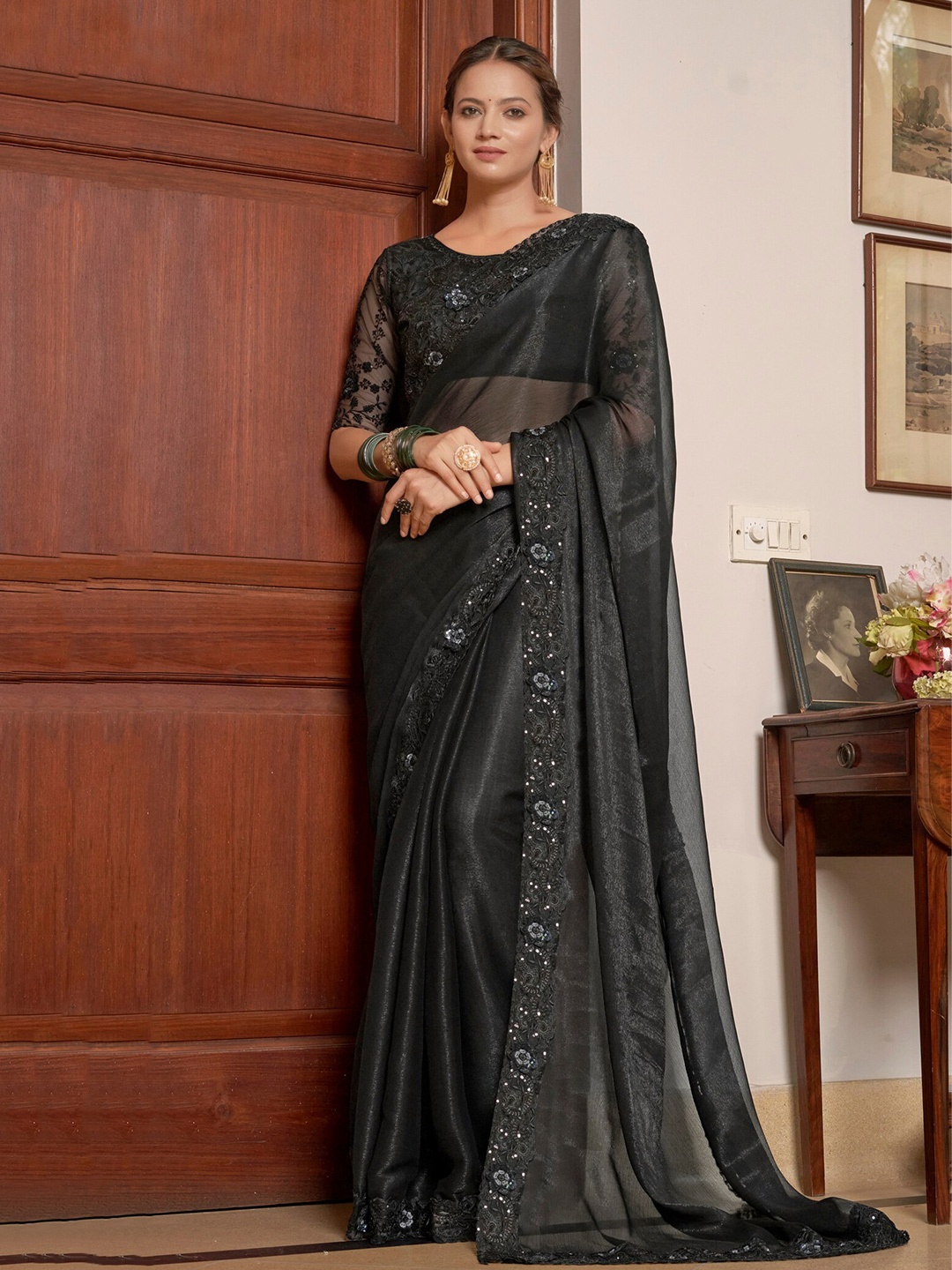 

Kalista Black Sequinned Pure Chiffon Saree