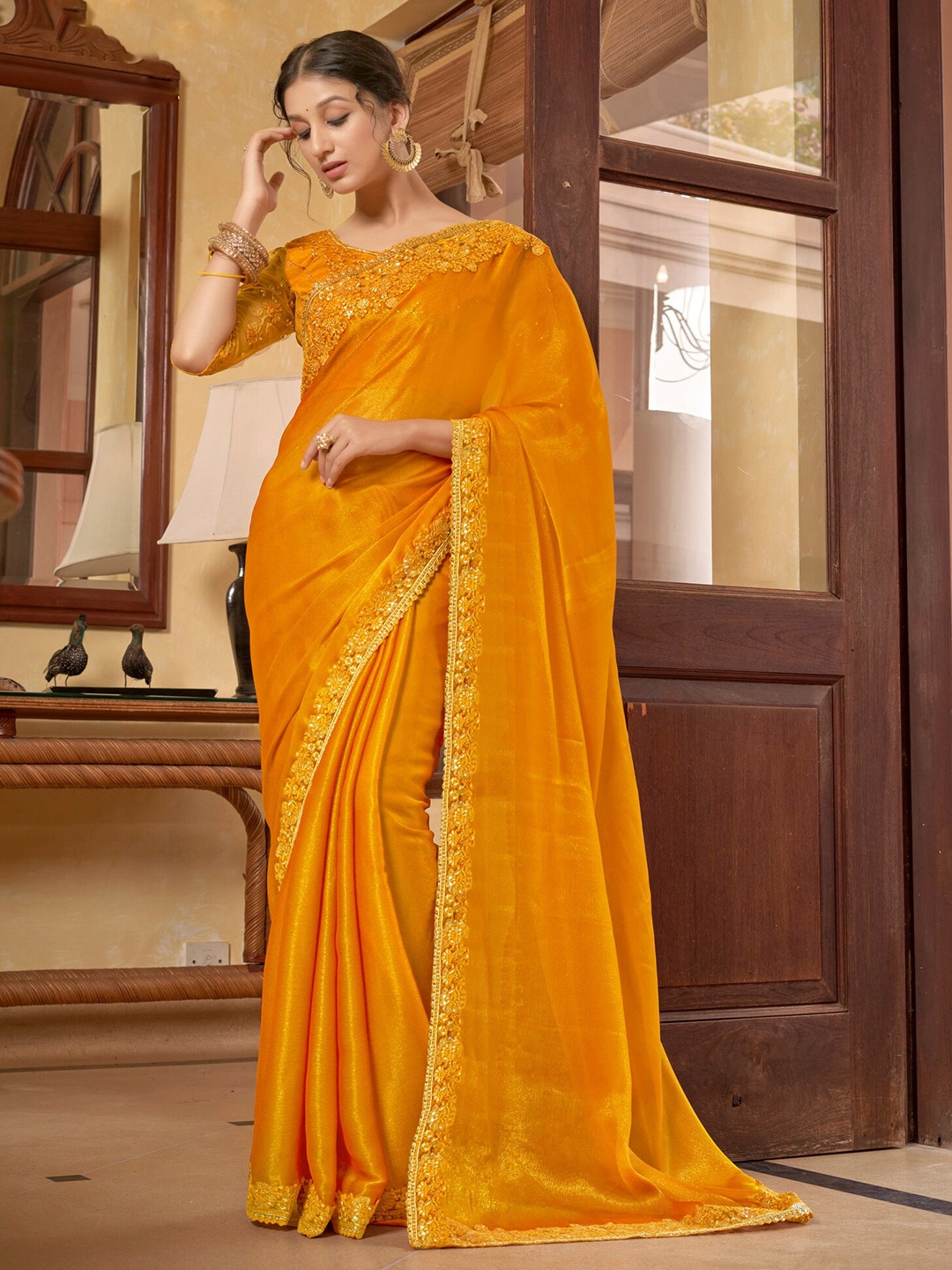 

Kalista Mustard Yellow Embroidered Pure Chiffon Saree