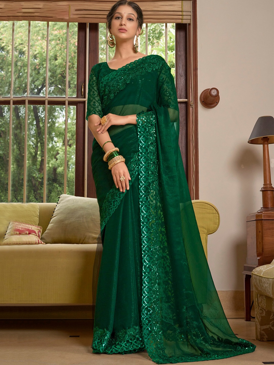 

Kalista Green Sequin Embellished Pure Chiffon Saree