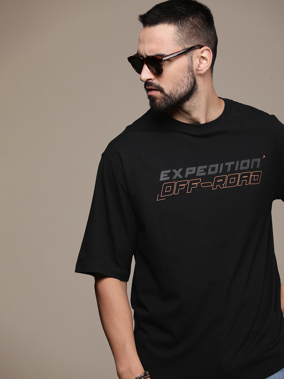 

Roadster Men Typography Printed Drop-Shoulder Sleeves Pure Cotton Oversized T-shirt, Black