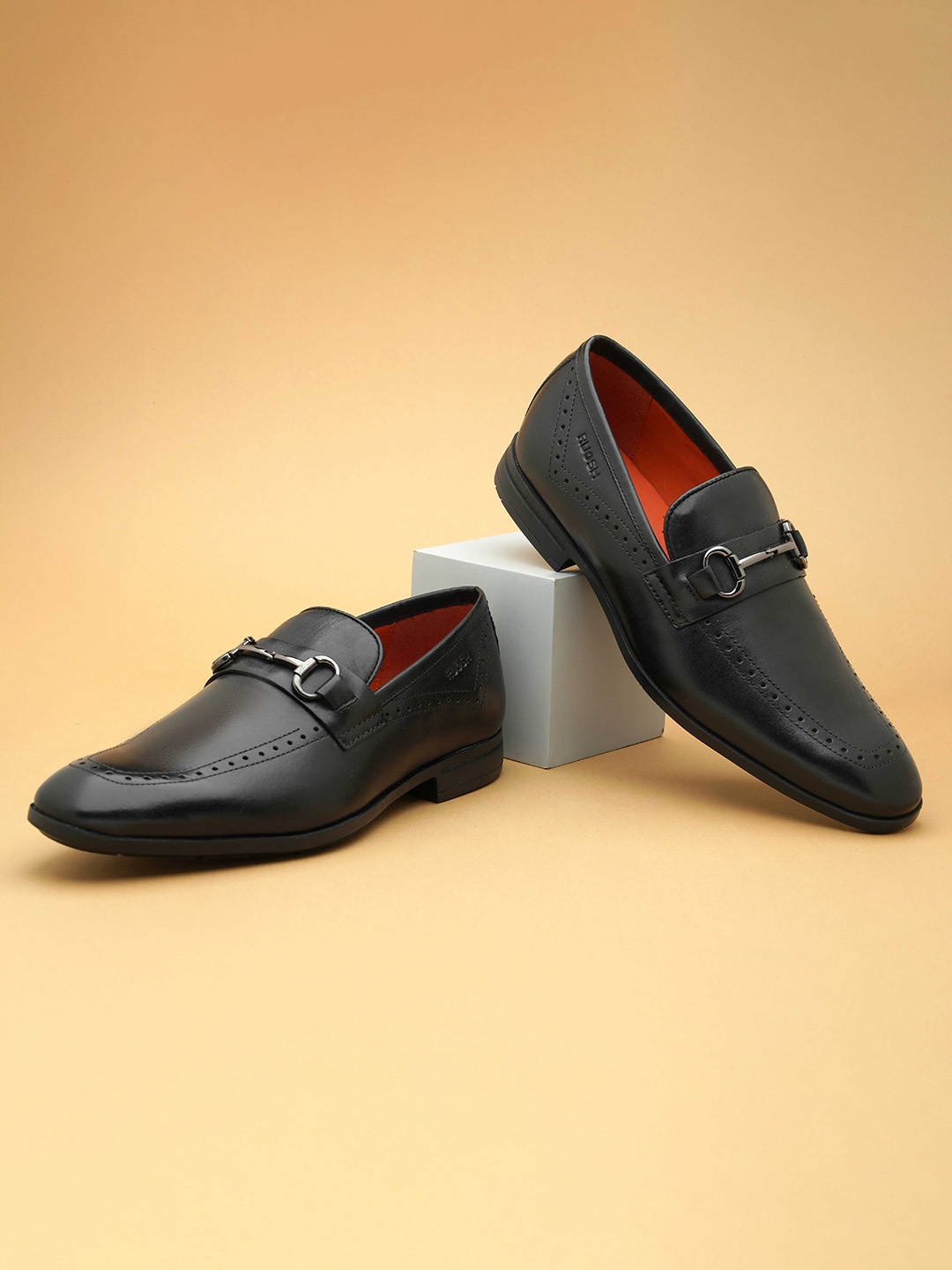 

Ruosh Men Textured Leather Formal Horsebit Loafers, Black