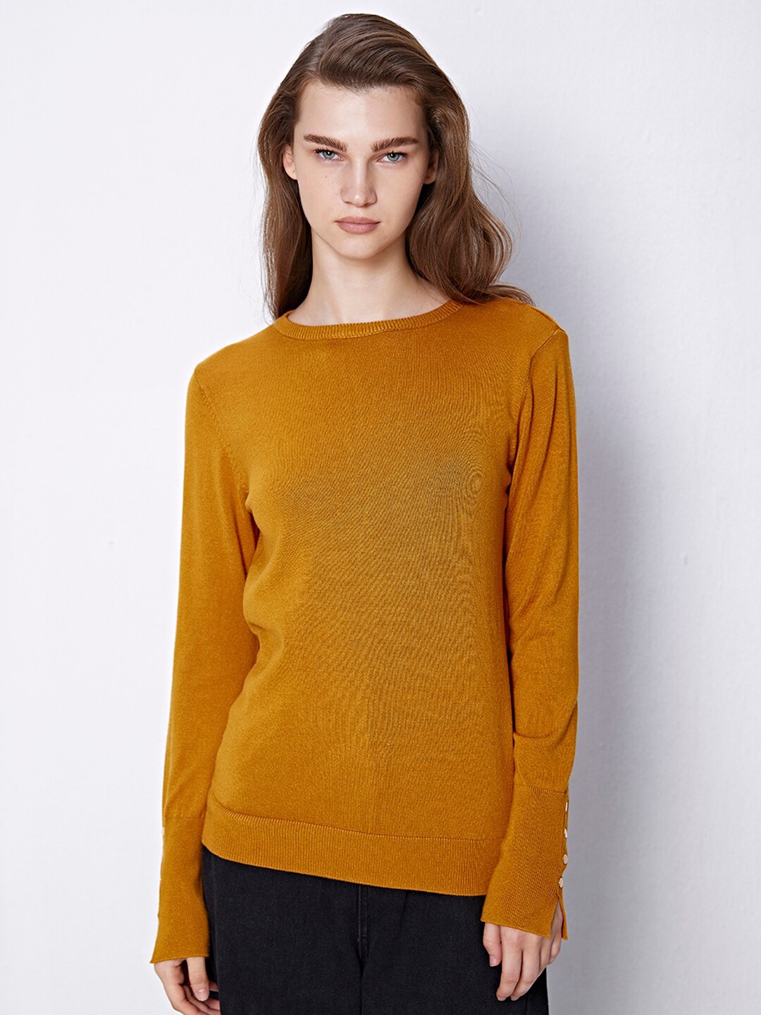 

COVER STORY Mustard Ribbed Pullover