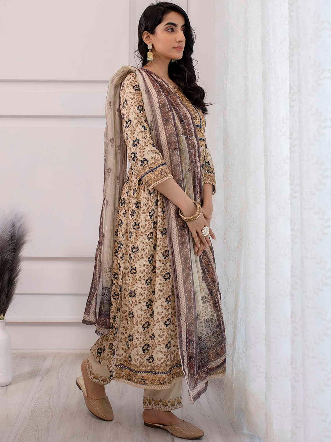 

Nehamta Ethnic Motif Printed Mirror Work A-Line Kurta & Trousers With Dupatta, Cream