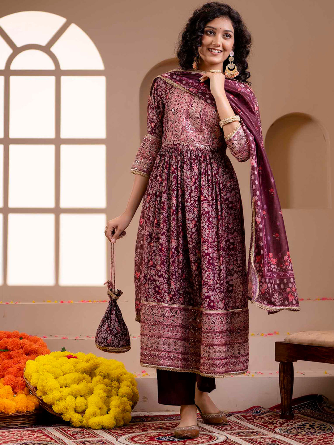 

Nehamta Floral Printed High Slit Mirror Work Kurta with Trousers & Dupatta Potli Set, Purple