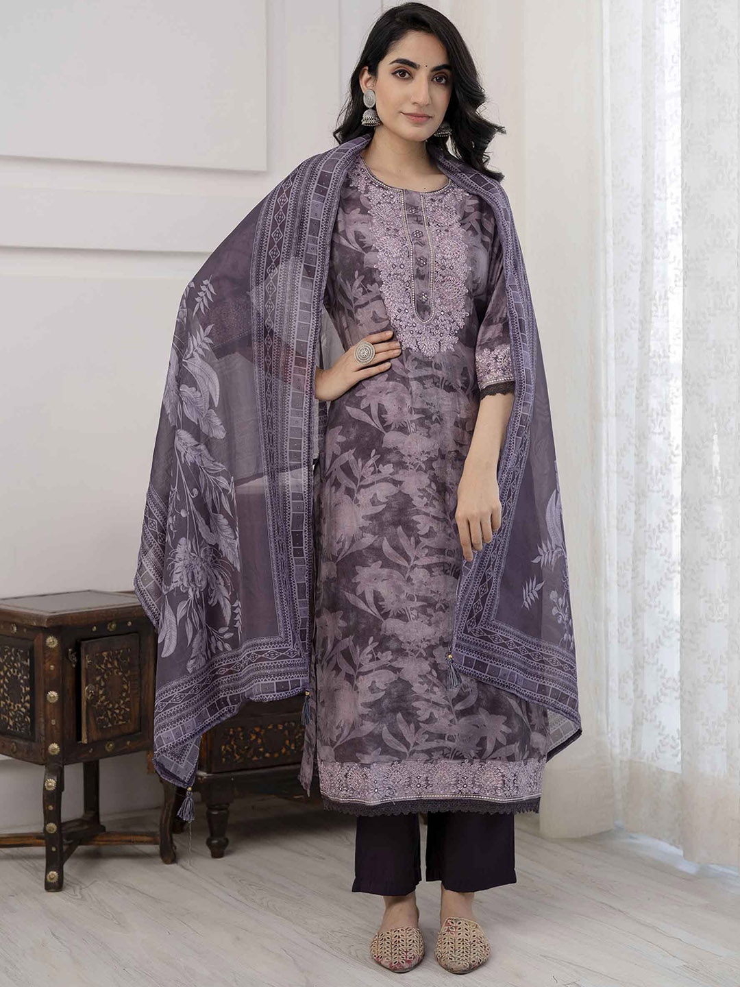 

Nehamta Floral Printed Regular Thread Work Kurta With Trousers & Dupatta, Purple