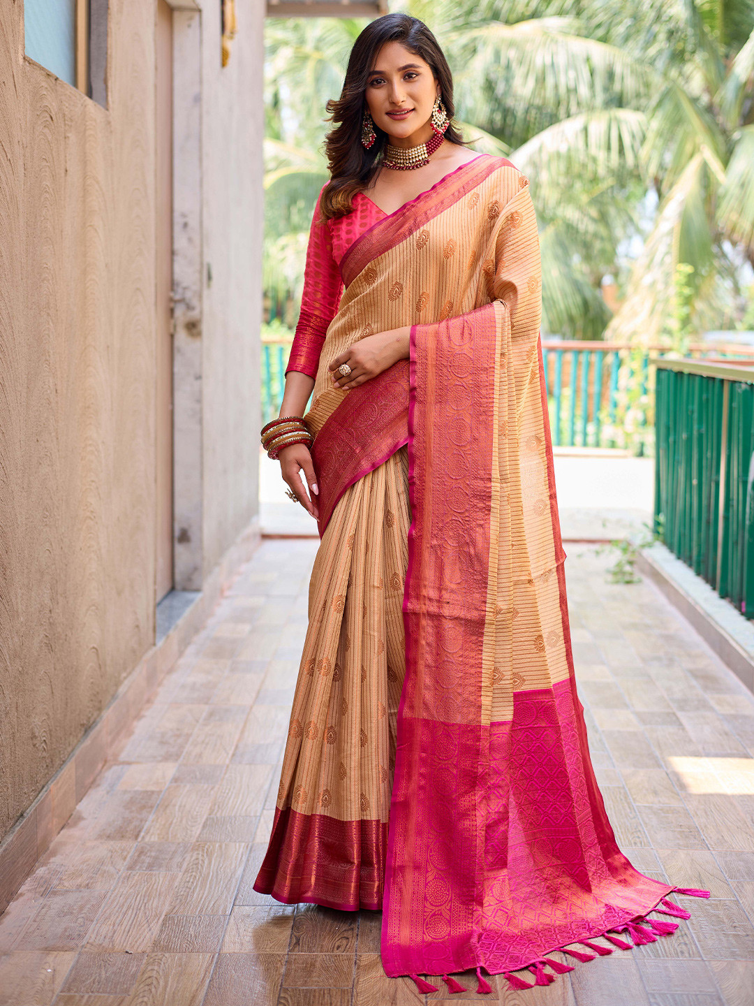 

Mitera Orange & Pink Ethnic Motif Woven Design Zari Kanjeevaram Saree