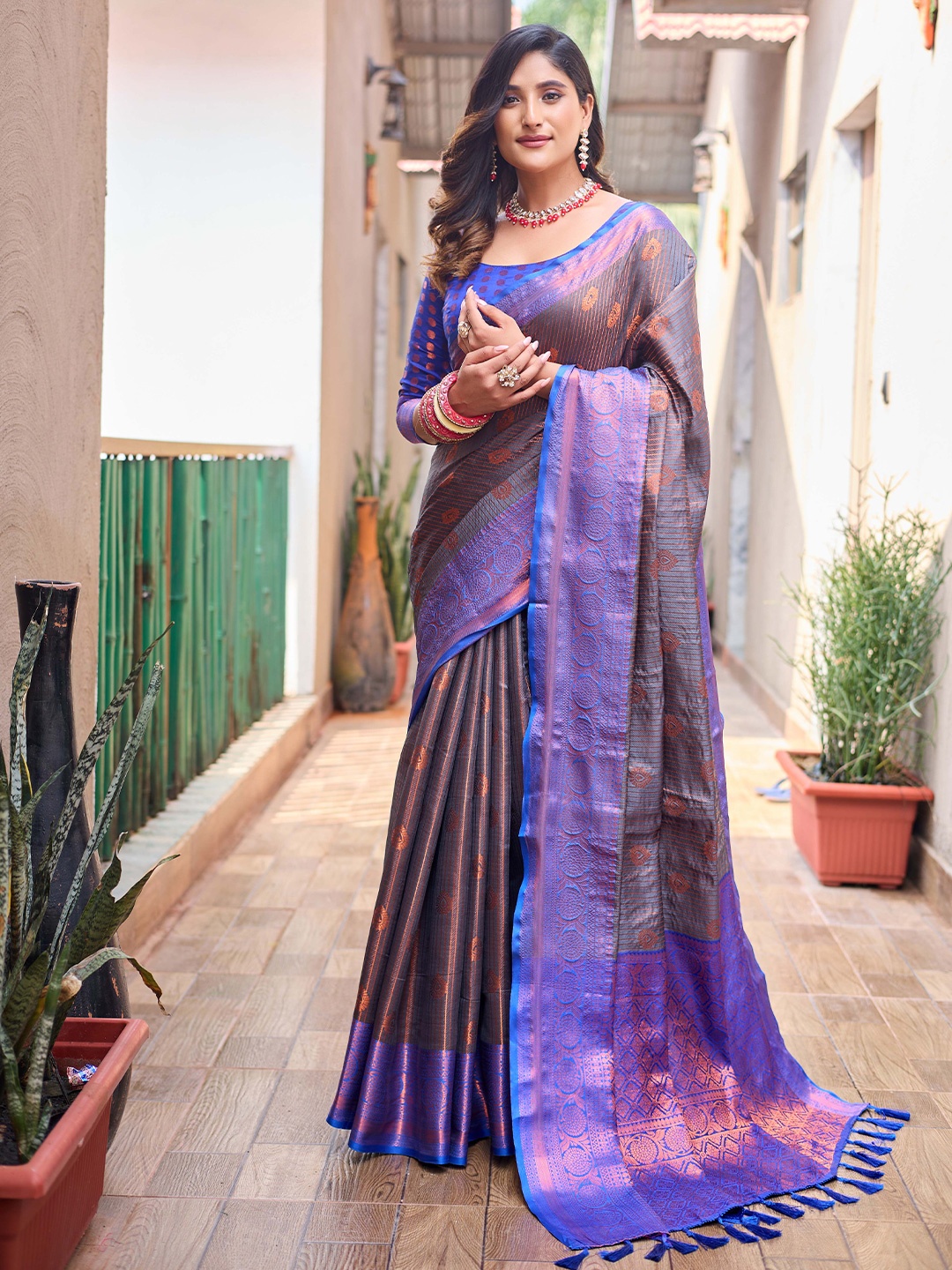 

Mitera Grey & Blue Ethnic Motifs Woven Design Zari Kanjeevaram Saree