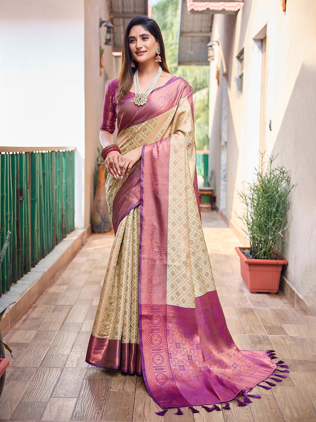 

Mitera Green & Purple Ethnic Motifs Woven Design Zari Kanjeevaram Saree