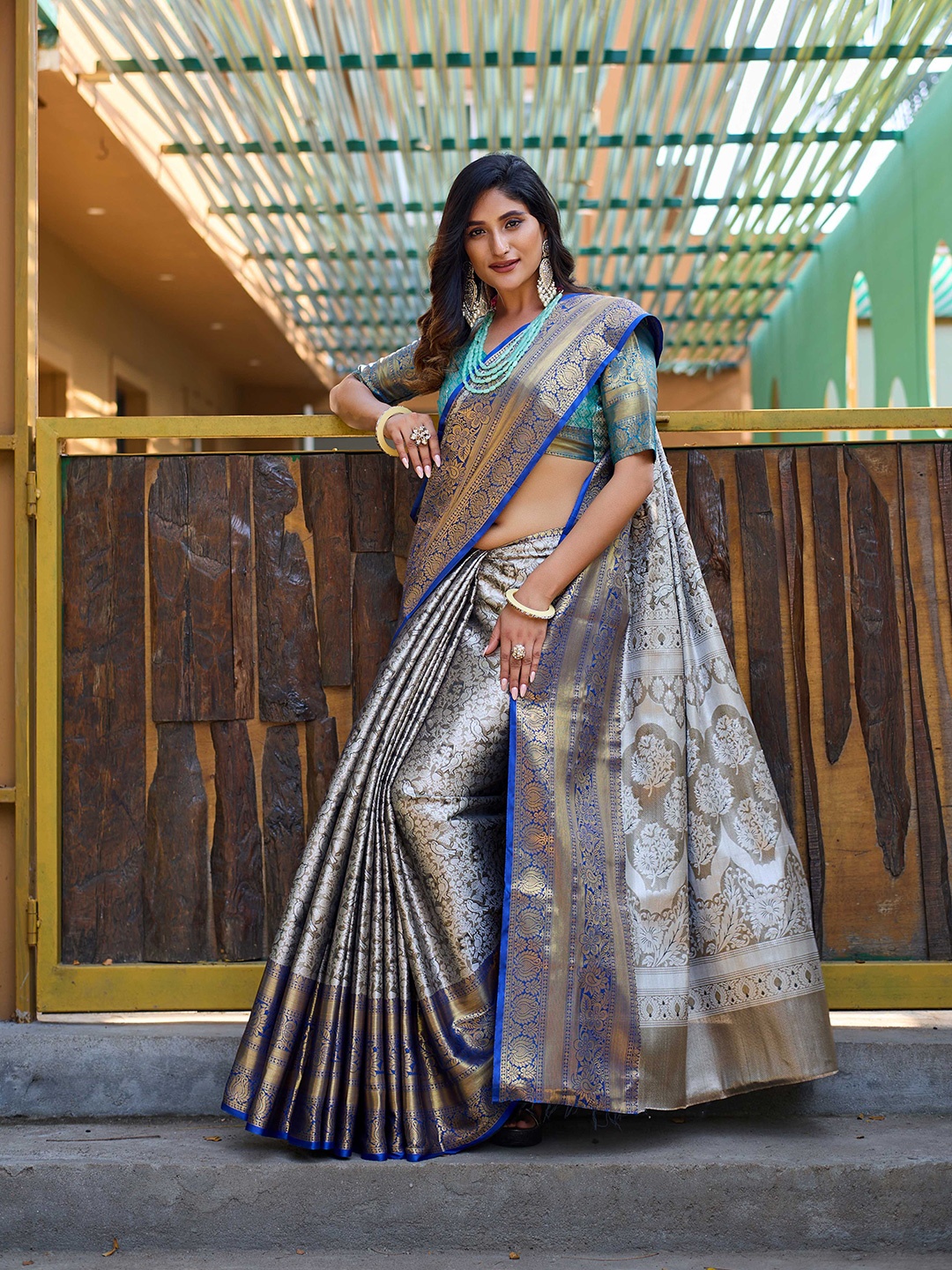 

Mitera Grey & Blue Ethnic Motifs Woven Design Zari Kanjeevaram Saree