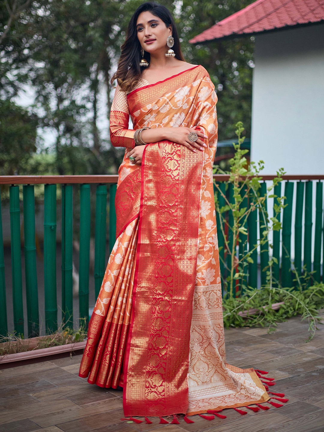 

Mitera Orange & Red Ethnic Motifs Woven Design Zari Kanjeevaram Saree