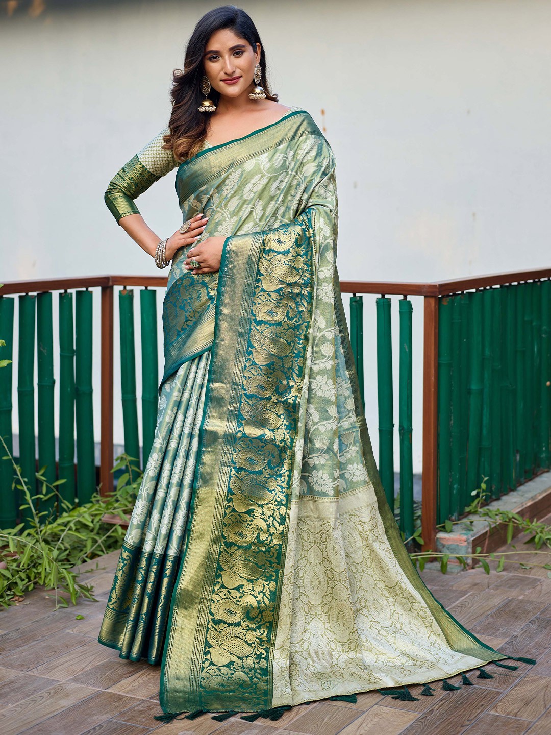 

Mitera Green & Gold Ethnic Motifs Woven Design Zari Kanjeevaram Saree
