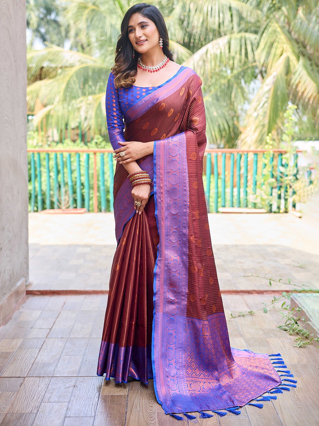 

Mitera Maroon & Purple Ethnic Motifs Zari Kanjeevaram Saree