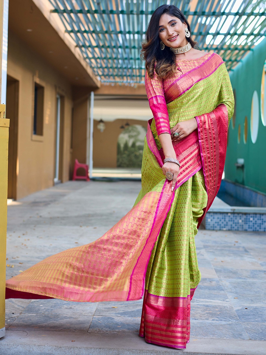 

Mitera Green & Red Ethnic Motifs Woven Design Zari Kanjeevaram Saree