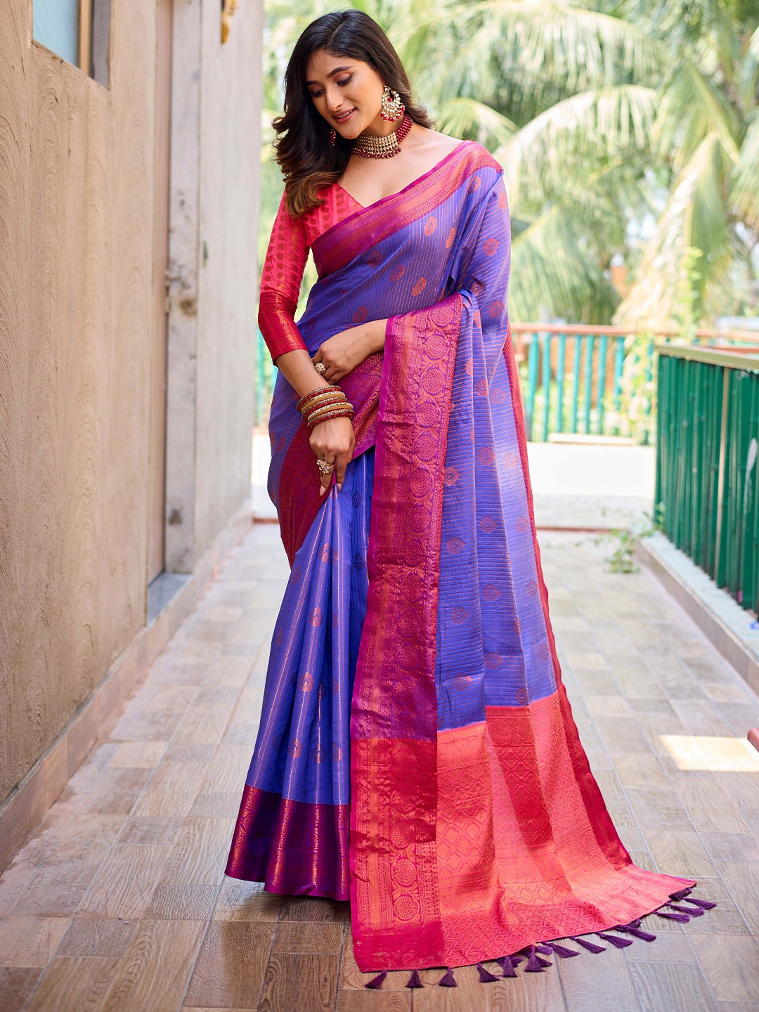 

Mitera Purple & Pink Ethnic Motif Woven Design Zari Kanjeevaram Saree