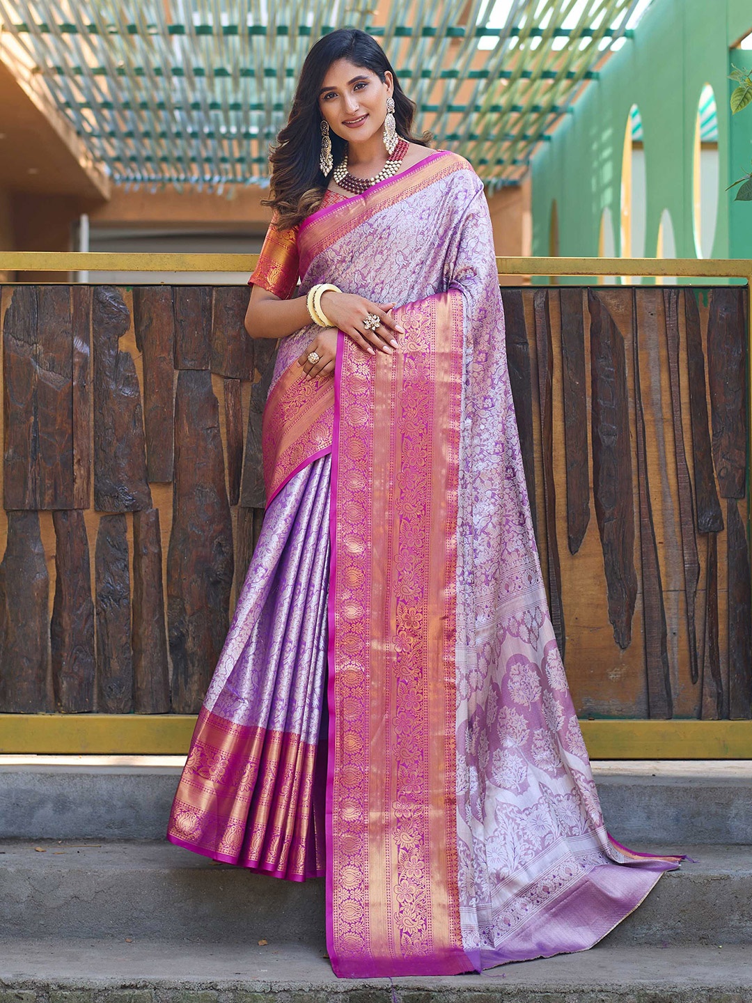 

Mitera Lavender & Purple Ethnic Motif Woven Design Zari Kanjeevaram Saree