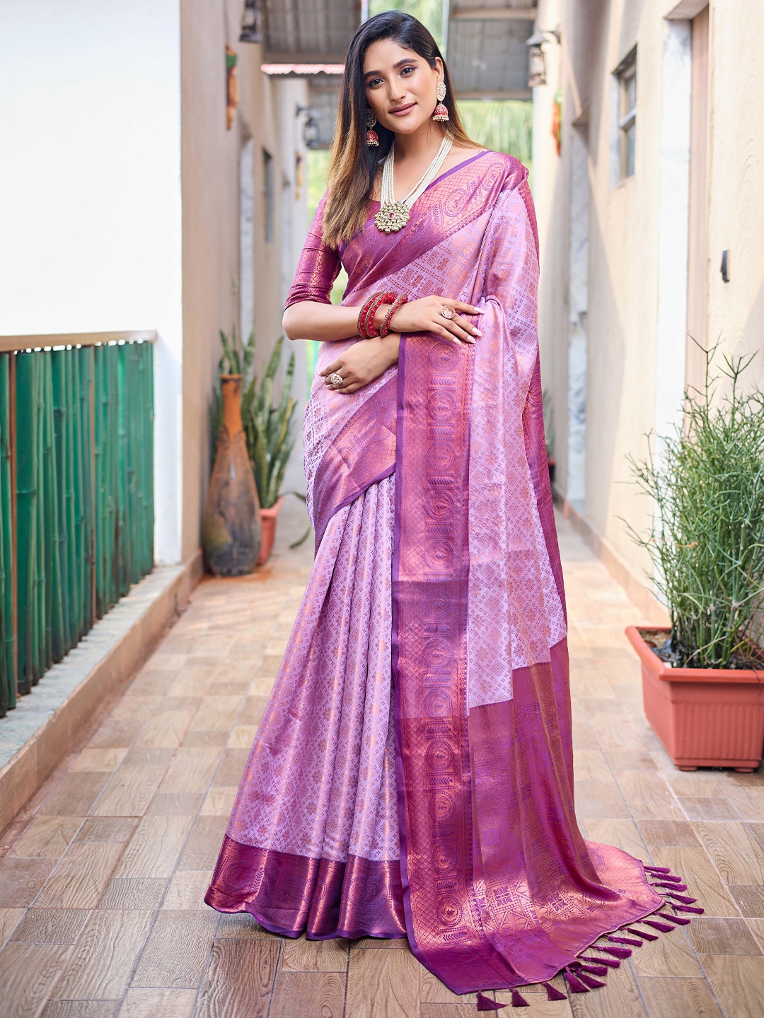 

Mitera Lavender & Copper-Toned Ethnic Motifs Woven Design Zari Kanjeevaram Saree