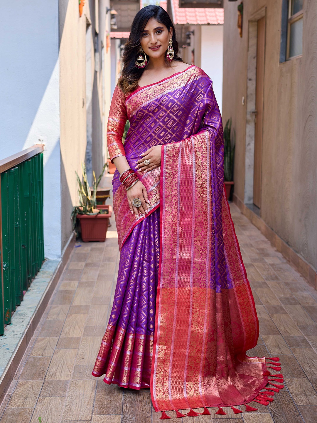 

Mitera Purple & Pink Ethnic Motifs Woven Design Zari Kanjeevaram Saree