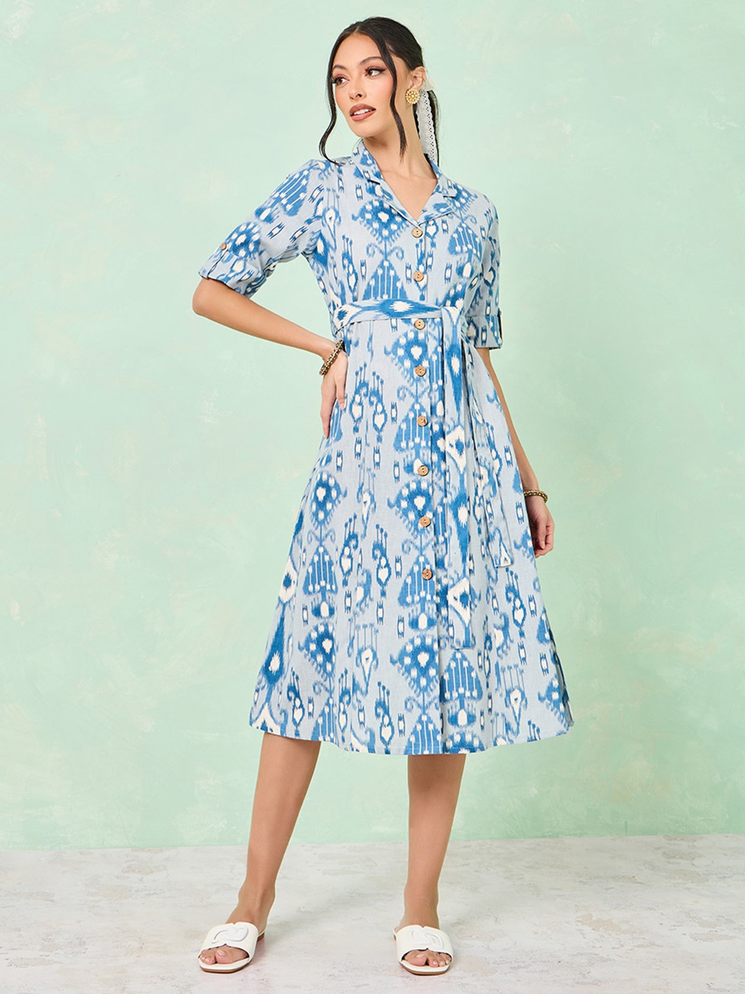 

Styli Blue Ikat Printed Lapel Collar Roll-Up Sleeves Belted A-Line Midi Ethnic Dress