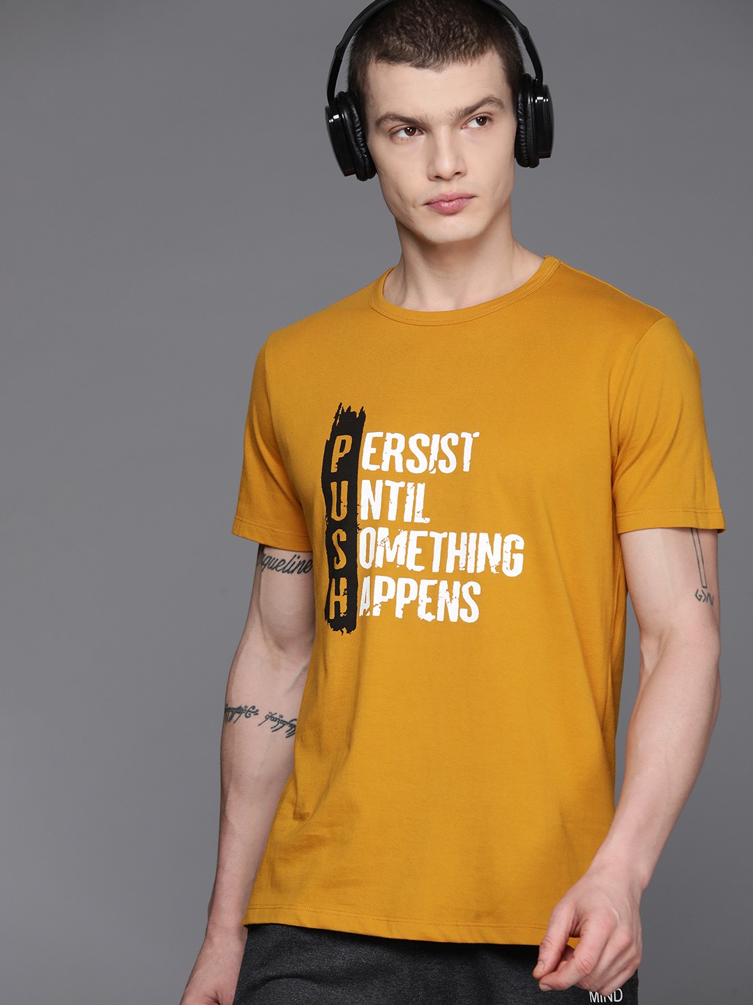 

HRX by Hrithik Roshan Men Typography Printed Regular Fit T-shirt, Mustard