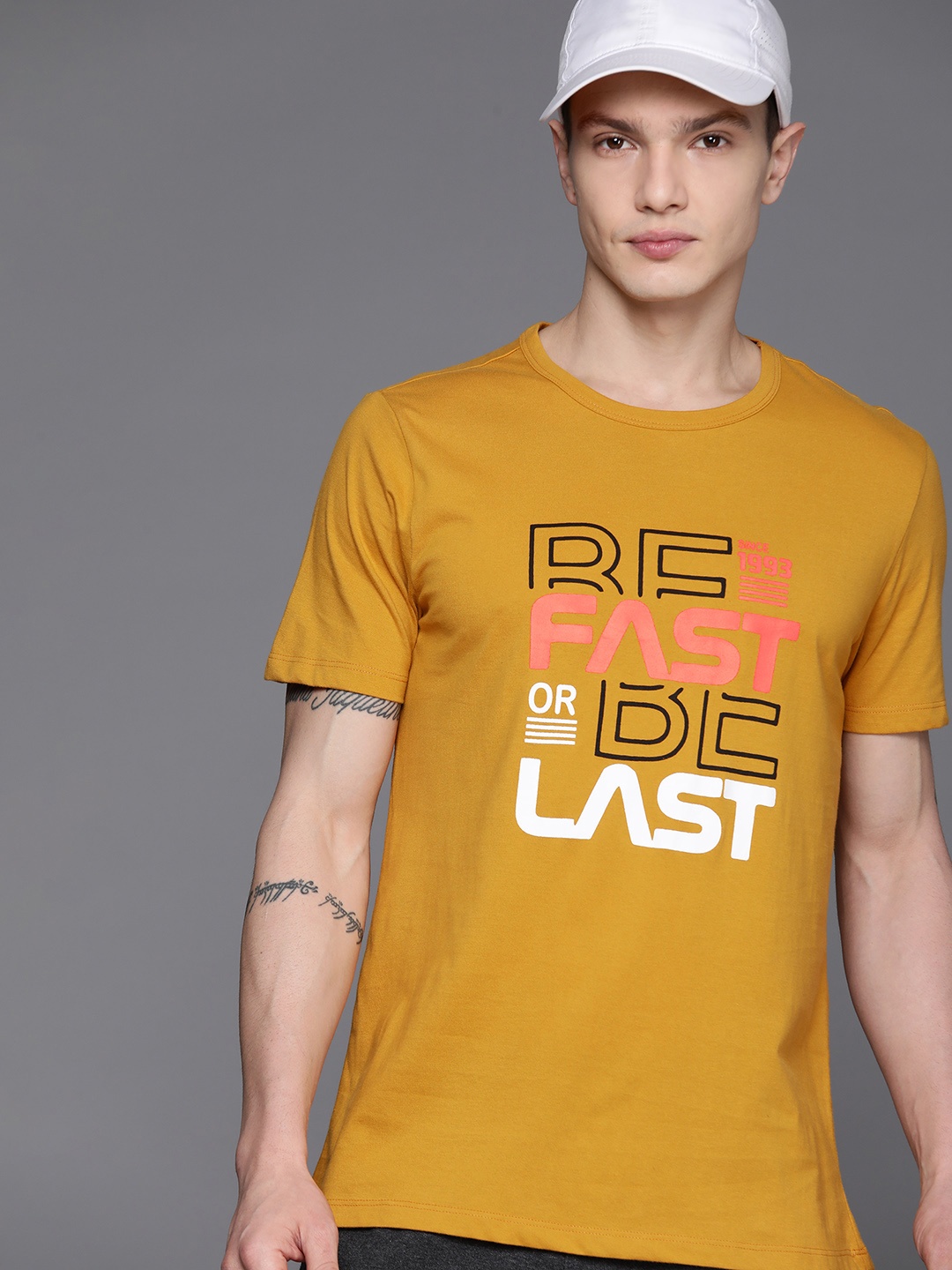 

HRX by Hrithik Roshan Men Typography Printed Regular Fit T-shirt, Mustard