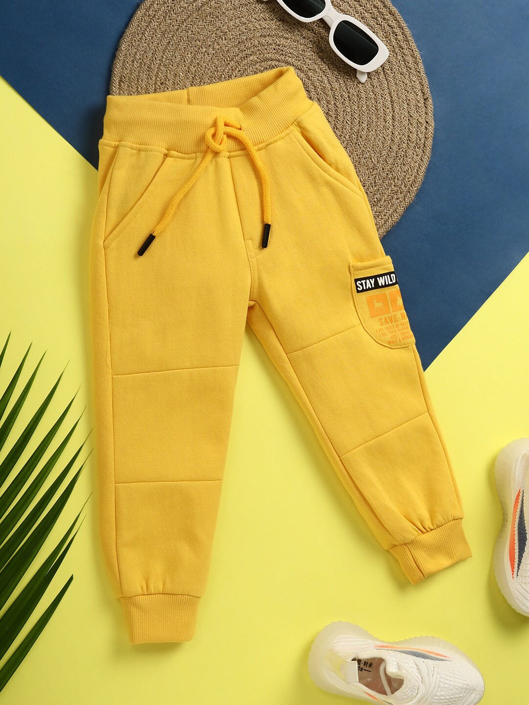 

V-Mart Boys Typography Printed Mid Rise Cotton Joggers, Yellow