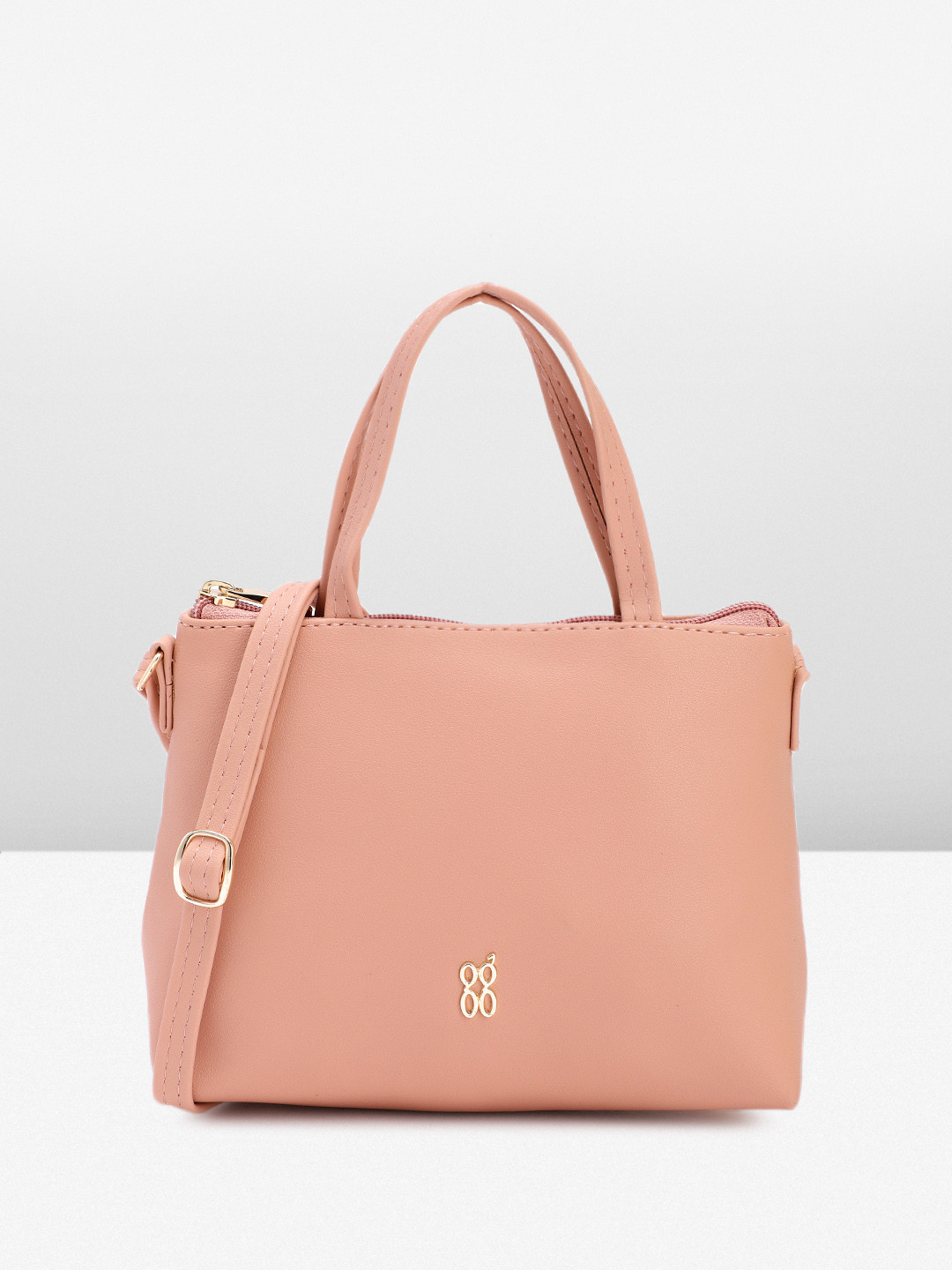 

Baggit Women Solid Handheld Bag, Pink