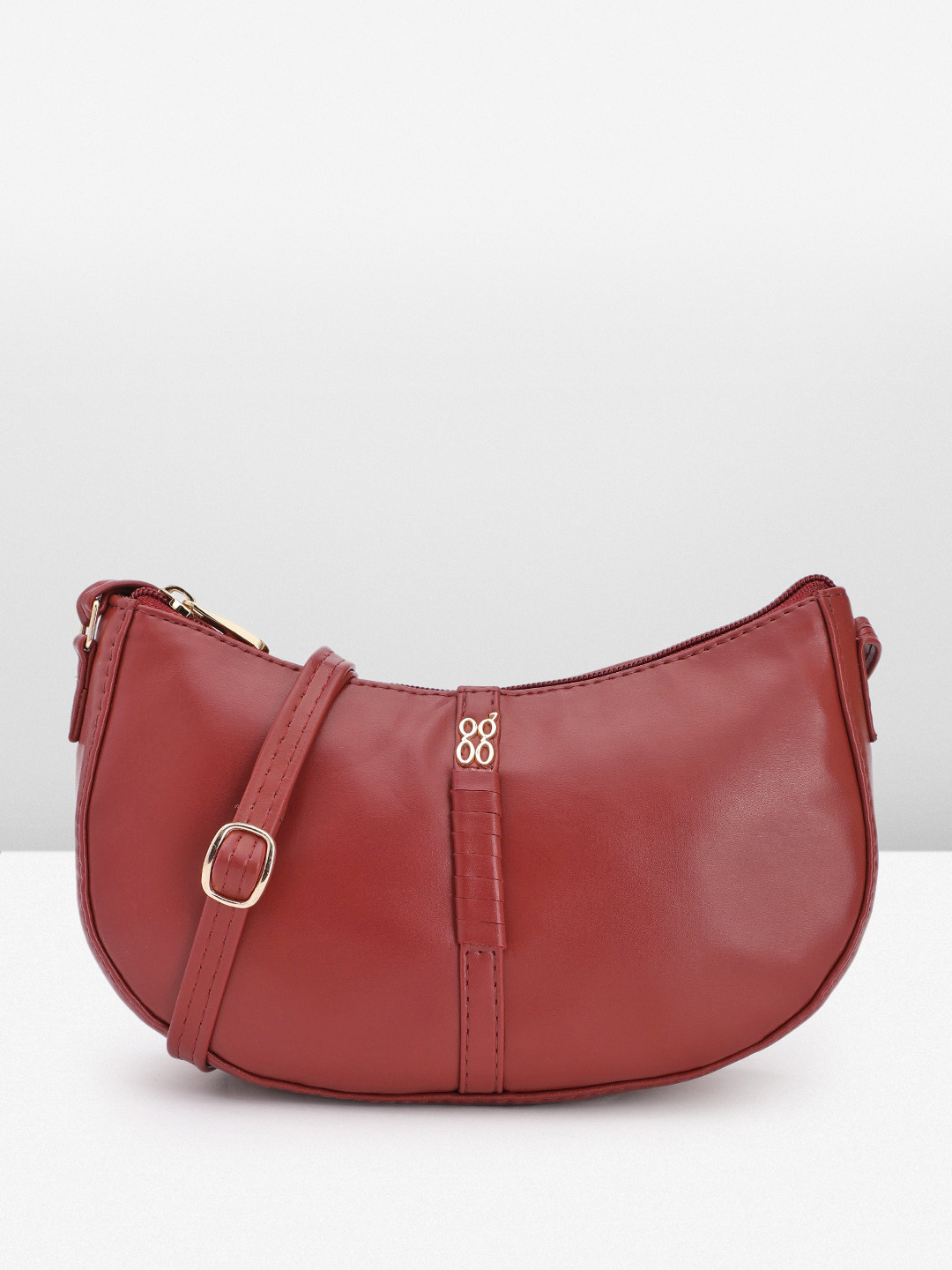 

Baggit Solid Half Moon Sling Bag, Maroon