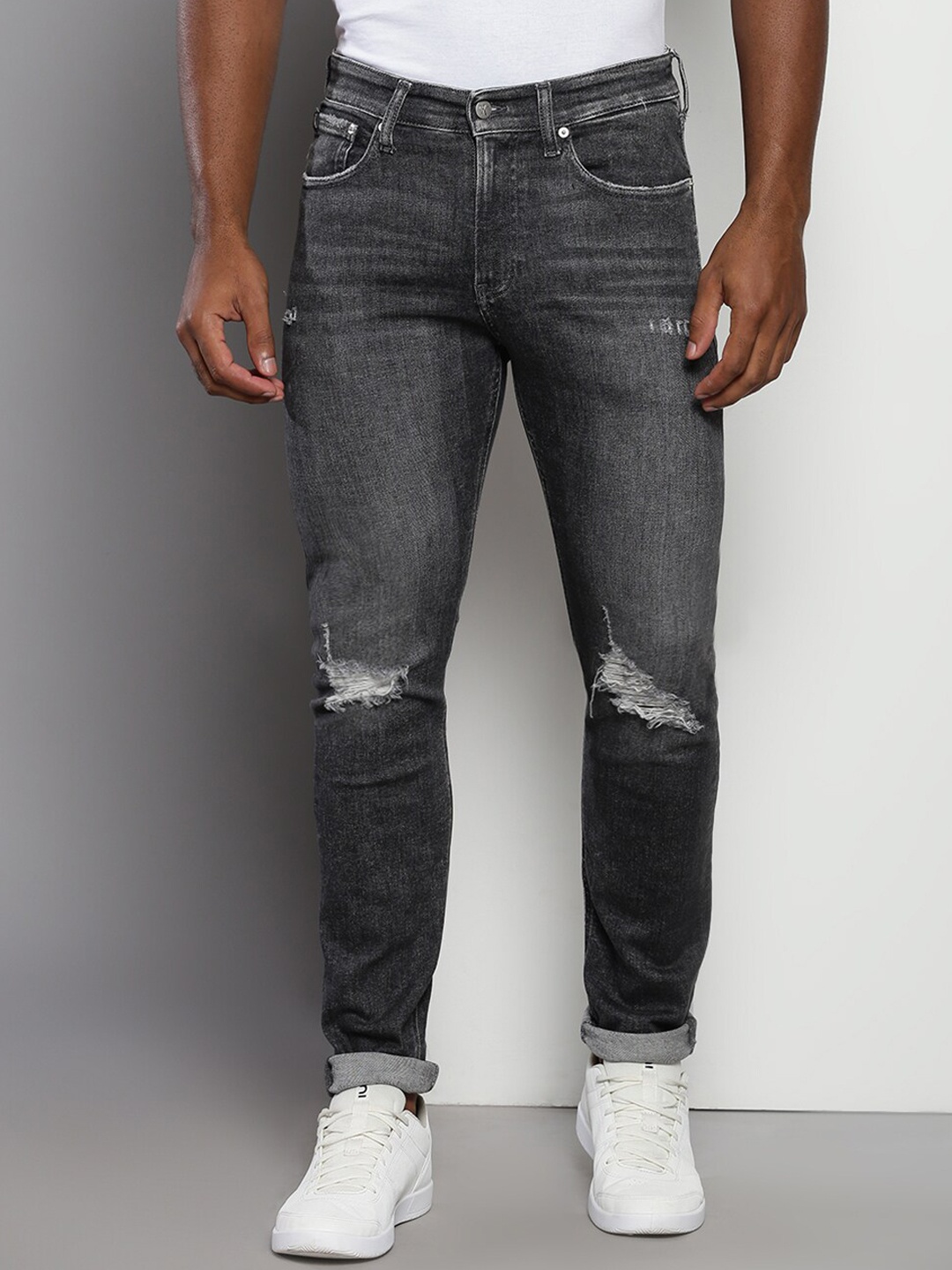 

Calvin Klein Jeans Men Skinny Fit Slash Knee Stretchable Jeans, Grey